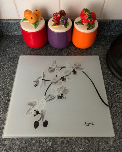 “Wild Orchids in Grayscale” Glass chopping board